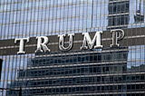The big, beautiful Trump name adorns an office building.