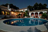 Sprawling Spanish-style mansion with a pool