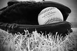 Picture of baseball glove and a baseball