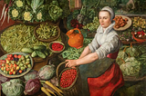 A painting of a young woman surrounded by an assortment of vegetables, fruits, and nuts in baskets. She has her hair tucked in a cap, a light colored shirt with a standing collar and her sleeves are rolled up to her elbows. A dark green apron covers the front of her red dress from the waist down. She is holding a basket of red fruit.