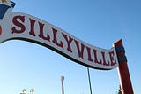 A curvy carnival sign reading, “Sillyville”