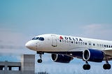 A Delta Airlines jet taking off.