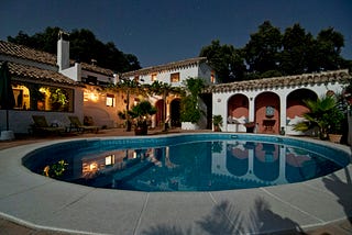 Sprawling Spanish-style mansion with a pool