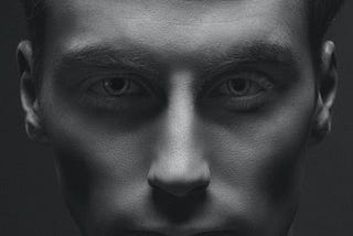 monochrome photo of man's face