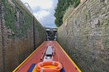 Photo by Author — onboard a narrowboat on a lock on the Oxford Canal