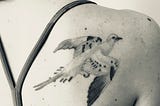 9 Tattoos of Extinct and Imperiled Species