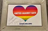 Framed Human Rights Campaign postcard signed, “Niamh — Stay Awesome! XOX Carson Kressley”