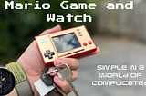 Mario game and watch, simple in a world of complicated. with a photo of a hand holding a small mario themed gaming device.
