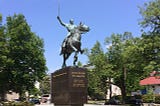 Color photograph of the equestrian statute of Simon Bolivar in the Simon Bolivar Park in Washington, D.C.