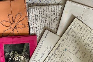 Envelopes of letters from the author’s friend Ella covered with Ella’s handwritten notes.