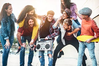 group of young adults with a boom box representing generation