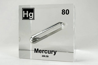 Why is mercury, unlike all other metals, including its neighbors on the periodic table, liquid?