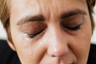 Close up image of a crying woman