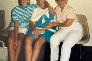 Three generations of women sitting next to one another, photo taken in 1988