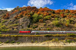 Train alongside River