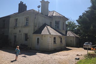 Ex-care home Victorian villa on a sunny day
