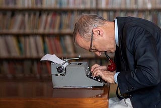 David Sedaris at a typewriter