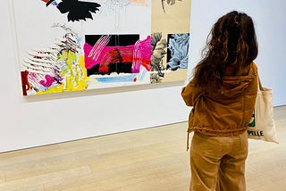Me contemplating art in a NYC gallery — Photo by the author