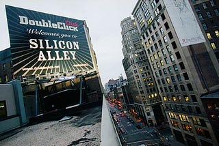 Street view of New York City featuring a billboard that reads “DoubleClick Welcomes you to SILICON ALLEY.”