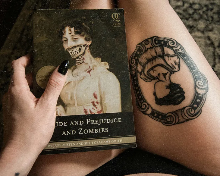 The gruesome cover of the novel Pride and Prejudice and Zombies with the bones beneath a woman’s face showing. All clues to the story.