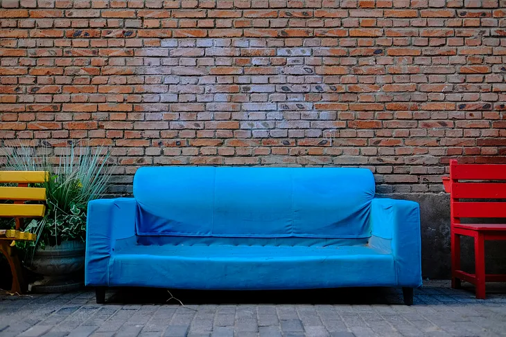 Empty blue couch.