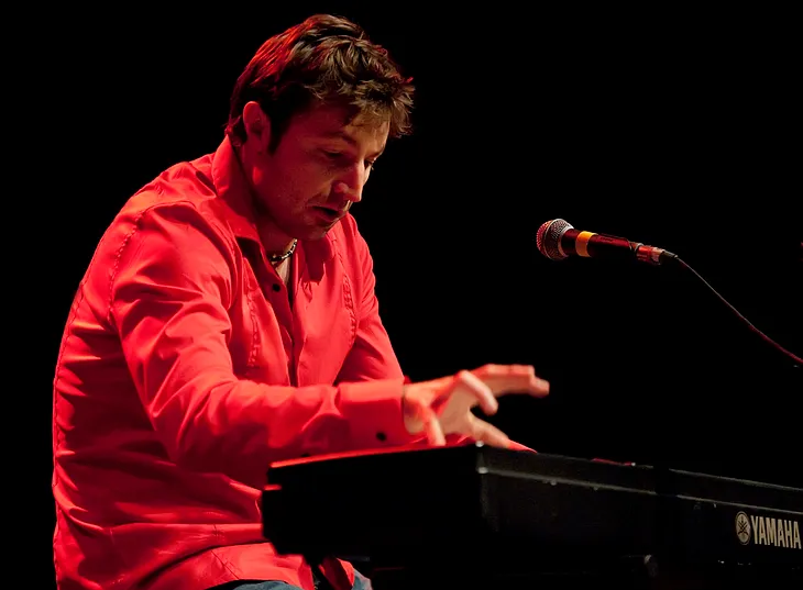 Gentry Bronson performing on a Yamaha electric piano at the Mystic Theater on December 2, 2011